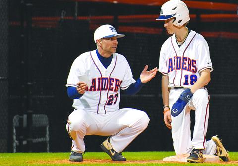 Habersham Central baseball coach Chris Akridge talks to  Kaleb Chastain during an opponent’s mound visit last season. CODY ROGERS/Staff