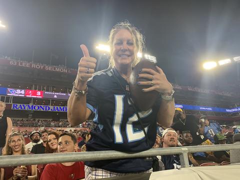 Janet Kinsey got a special treat from her son at the Tampa Bay game – the ball from his first professional touchdown. Photo by CORY CURTIS/Special