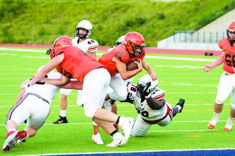 Habersham Central’s Carson Parker dives in for the Raiders’ only touchdown during Friday’s scrimmage. TOM ASKEW/Special