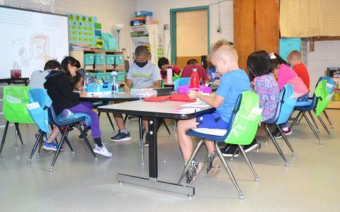 Second grade students dive into their studies in Ms. Sonya Elias' class at Baldwin Elementary. BRIAN WELLMEIER/Staff
