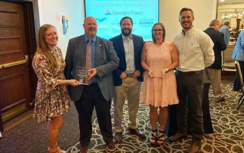 Cornelia representatives (from left) Emily Herrin, Donald Anderson, John Borrow, Jessie Owensby and Heath Barrett celebrate the city’s awards at the Georgia Downtown Association (GDA) Conference. CHARLIE FIVEASH/Submitted