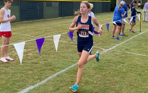 Habersham Central’s Audrey Hotard nears the finish line during Saturday’s meet in Athens. BRYANT ROCHE/Staff