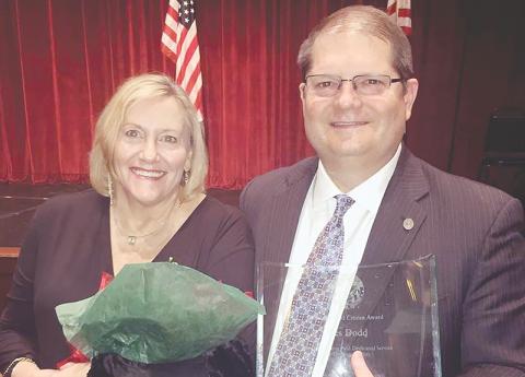 Cornelia Commissioner Wes Dodd is shown receiving the Distinguished Citizen Award from the Northeast Georgia Council of Boy Scouts along with his wife Kerri.