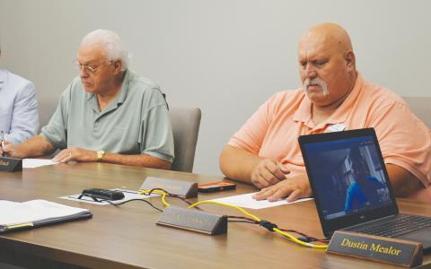 Habersham County Commissioners Bruce Palmer (right) and Jimmy Tench participate in a work session in June.