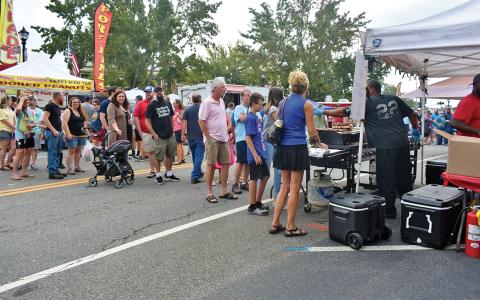 Folks enjoy the vendors at the 2019 Big Red Apple Festival in Cornelia.