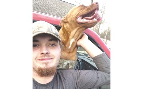 Austin Wilkes is shown in better times with his dog Remi. ANSLEY  WILKES/Submitted