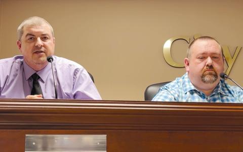 Shawn Allen (left) speaks at Thursday’s Demorest forum as opponent Roy Ferguson listens. MATTHEW OSBORNE/Staff