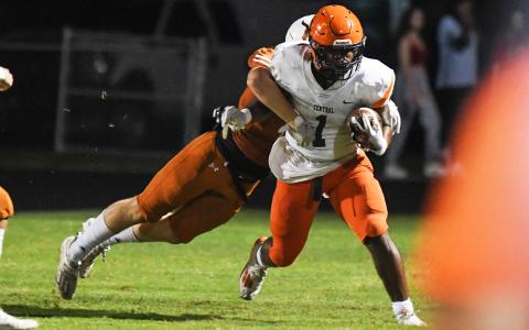 Sirmarcus Burney drags a Lanier tackler on Friday night. TOM ASKEW/Special