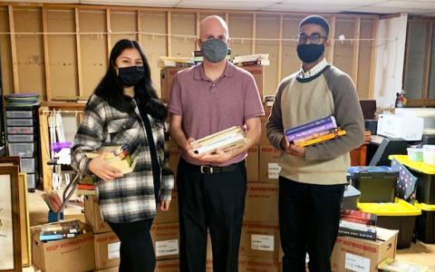 From left, Student Organization of Latinos President Odalys Rendon, Lillian E. Smith Center Director Dr. Matthew Teutsch, and Student Government Association President Michael Mack have teamed up to collect more than 1,000 books to benefit X Books and Common Good Atlanta, organizations dedicated to improving the state’s prison education programs. MATTHEW TEUTSCH/Submitted