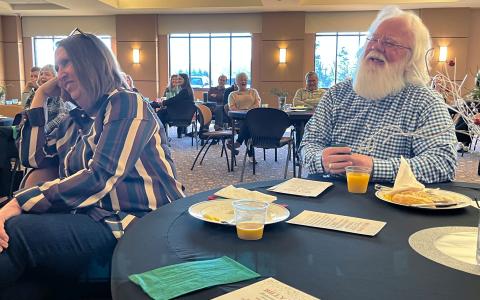 Billy Boyd and his wife Martha share a laugh during remarks at Boyd’s retirement breakfast Thursday morning at Habersham EMC headquarters. Boyd was the United Way Executive Director for the last seven years. MATTHEW OSBORNE/Staff