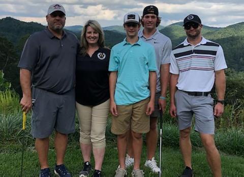 Shane Dover is shown with his family - wife Kristie and sons Sawyer, Sutton and Slade.