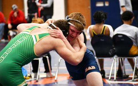 Habersham Central’s Colby Watson goes to work against Buford’s Ben Martin at the Region 8 Duals on Jan. 8. MATTHEW OSBORNE/Staff