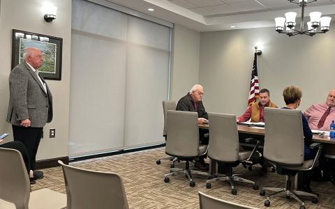 Doug McDonald (left) expressed his displeasure Monday with the county commissioners seeking a new airport manager. McDonald also attended the Airport Commission meeting earlier in the day. MATTHEW OSBORNE/Staff