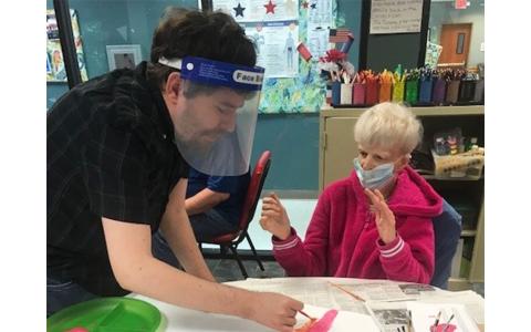 Matthew and Priscilla express themselves during craft time during Avita’s Community Access Group’s session. CINDY LEVI/Submitted