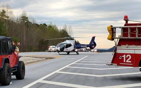 An Airlife helicopter landed in the middle of Highway 17 on Tuesday morning after a shooting victim needed immediate medical attention nearby. SAMANTHA SINCLAIR/CNI News Service