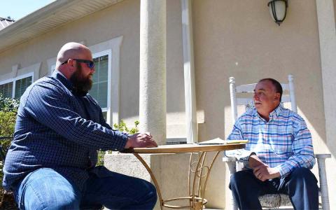 Nathan Dodd (left) receives counseling from licensed counselor Mark Beach. BRIAN WELLMEIER/Staff