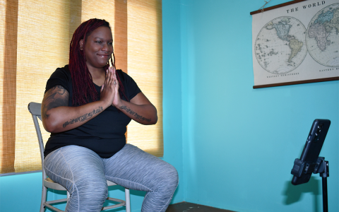 Corynne Stewart engages her yoga class via Zoom from her Clarkesville home. BRIAN WELLMEIER/Staff