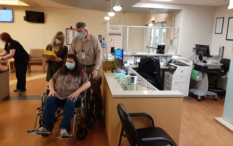 Stan Walters helps out a patient at Habersham Medical Center. MATT MILES/Submitted