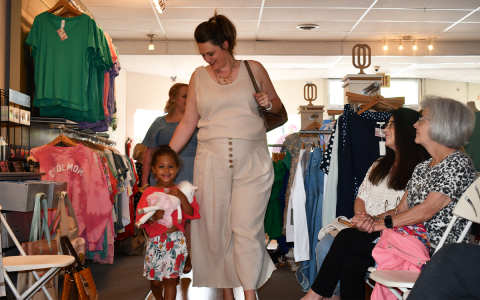 Kaitlin and Lucy Ellison sport new styles at the fashion show Sunday afternoon in Clarkesville. BRIAN WELLMEIER/Staff