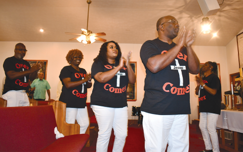 Far right is Dr. Vanessa Burns, Shady Grove Missionary Baptist Church’s choir Director. In front are (from left) Bishop Ernest Burns, Lisa Camp, Elder Shasmon Colbert, and Deacon Randy Hatcher as all four come into the church Sunday for the Choir Day celebration. BRIAN WELLMEIER/Staff