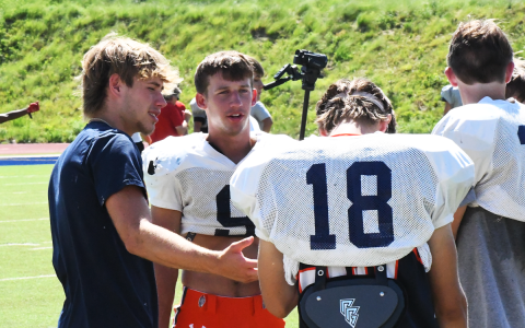 Habersham Central graduate and future Point University football freshman Caleb Wade, last year’s team MVP, gives sage advice to the Raiders at Wednesday’s practice. MATTHEW OSBORNE/Staff