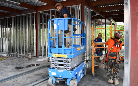 Crews work on HMC’s Habersham Home project, which was delayed by the COVID-19 pandemic. BRIAN WELLMEIER/Staff