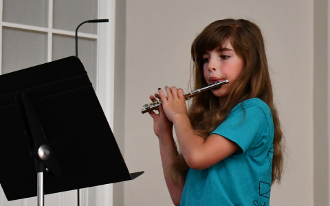 Fiona Gale plays “When the Saints Go Marching In” on the piccolo. BRIAN WELLMEIER/Staff