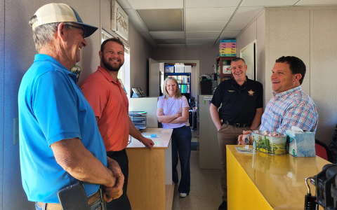 Tyler Harper, Georgia State Senator for District 7 and Republican nominee for state agriculture commissioner, speaks with  Ricky, Clint and Melinda James of Osage, as well as Rabun County Sheriff Chad Nichols and Georgia State Sen. Bo Hatchett of District 50. MEGAN BROOME/The Clayton Tribune 