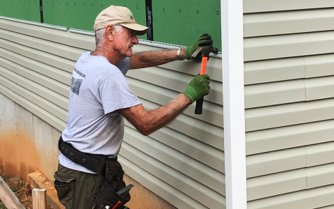 Jack Molnar works on a Habitat for Humanity house in Habersham County. NANETTE BAUGHMAN/Submitted