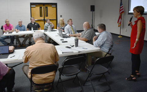 Habersham County Manager Alicia Vaughn (right) makes a presentation to the county  commission and the Tallulah Falls Town Council on Tuesday night. MATTHEW OSBORNE/Staff