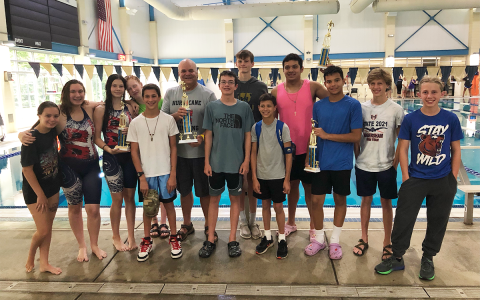 Hurricanes get together after a meet, inclkuding Tyler Willett, Sadie Hagel, Leah Culpepper, Skye Medley, Montgomery Roberts, Coach Mike Krippner, Caden Polley, Jesse Culpepper, Boone Roberts, Josh Martinez, Jayden Martinez, Grayson Penland and Teagan Penland. SUBMITTED