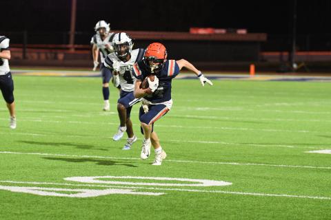 Habersham Central’s Canon Wilbanks gets a head start on everyone after catching an out pass Friday against White County. Wilbanks raced all the way to the end zone for a game-tying touchdown and added another in the fourth  quarter to seal the game. TOM ASKEW/Special