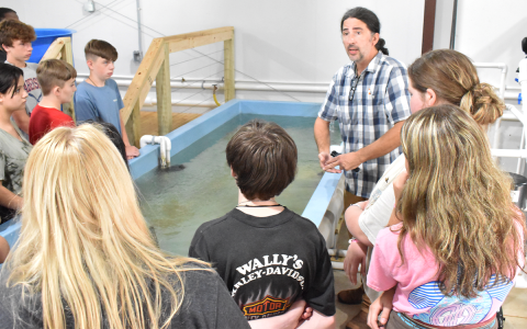 North Georgia Technical College Environmental Technology Instructor Duncan Hughes talks to a group of eighth-graders from North Habersham during their tour of the department on their “Color Tour.” AMARIS E. RODRIGUEZ/Staff