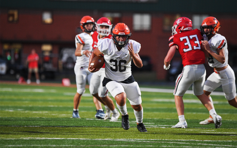 Habersham Central’s Hayes Gunn runs through a truck-sized hole Friday night on the way to a big gain against Forsyth Central. TOM ASKEW/Special
