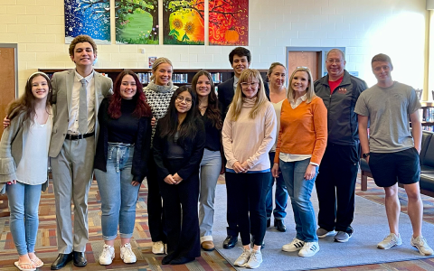 Participants in the 2021-2022 Mock Trial Team smile at the Regional Competition. Pictured are (Left to Right) Autumn Smith, Juan Borge Osorio, Sara Jones, Ella Kovalchik, Brina Diaz, Ella Reynolds, Smith Caudell, Sarah Carbo, Alison Singer, Tricia Hise, Rabun Kimzey, and Alex Godoy.  TRICIA HISE/Submitted