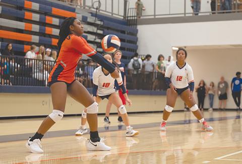 Habersham Central’s Amayah Dooley hits a bump to teammate Jazky Bantaum during the Lady Raiders’ third set against Jackson County earlier this season. ZACH TAYLOR/Special