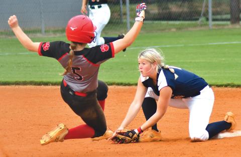 Rabun County’s Jacie McCall is tagged out at second base during a steal attempt on Aug. 24 by Habersham Central’s Jayden Thomas. LUKE MOREY/CNI News Service