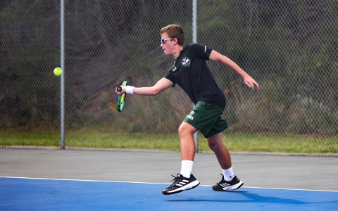 William NeSmith hits a groundstroke during his match against Rabun Gap. AUSTIN POFFENBERGER/Special