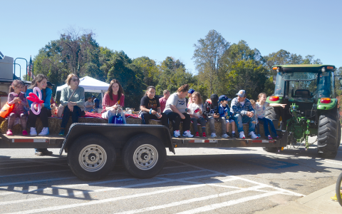 Folks enjoy a hayride last year at Baldwin’s fall festival. FILE