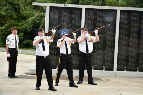 Members of the Grant-Reeves VFW Post 7720 Honor Guard (from left) Bill McAllister, Roy Albea, Brady Morgan and Dana McCloud help remember the anniversary of the 9/11 attacks at the Wall of Honor in Cornelia on Sept. 11. FILE