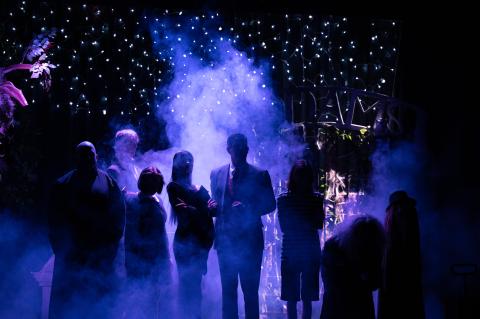 The Kollock stage curtain opens to reveal a foggy Addams Family backlit by the cemetery. ZACH TAYLOR/Special