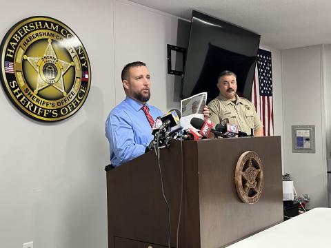 Habersham County Sheriff’s Investigator George Cason shows a picture of Deborrah Collier’s car captured by the  Tallulah Falls school zone cameras as Col. Murray Kogod (right) observes. MATTHEW OSBORNE/Staff
