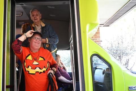 Joy Burrell and Helen Dove get off the Habersham County Senior Center’s new transit bus with a smile. JOHN DILLS/Staff