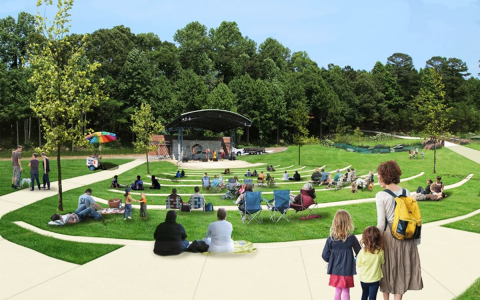 A rendering shows the proposed renovation of the Cornelia Motors  property space, along U.S. 441 Highway, a 4.8-acre lot, transformed into a luscious space including an amphitheater.