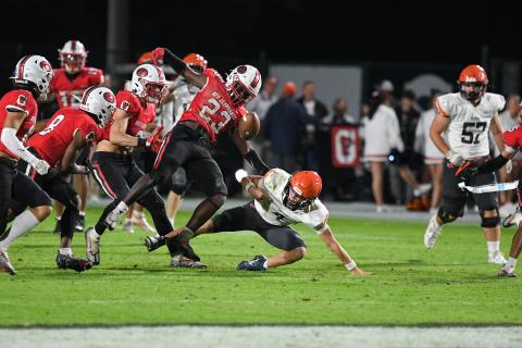 Gainesville’s Carmelo Byrd (23) rips the ball out from the grasp of Habersham Central’s Carson Parker during Friday night’s game at City Park in Gainesville. TOM ASKEW/Special