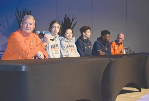 Habersham Central girls basketball coach Bill Bradley responds to a question at the FCA Media Day in Gainesville on Wednesday morning. Joining him on the stage were his players, Kyia Barrett and Jazky Bantaum, along with Raiders Cole Gary and Bryce Pittman, and boys coach Tommy Yancey.