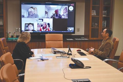 Habersham Medical Center CEO Tyler Williams and executive assistant Phyllis Brooks prepare to meet with the Hospital Authority by Zoom on Monday afternoon. MATTHEW OSBORNE/Staff