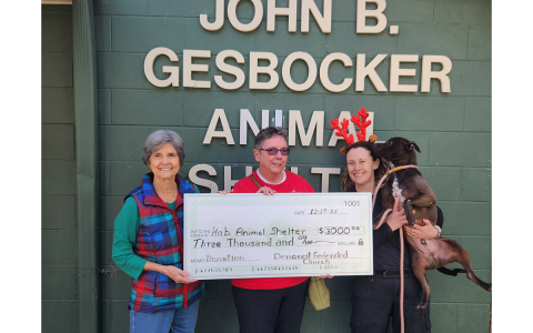 Shown are Church Treasurer Alta Moseley and Pastor Joyce Acree (left) presenting Nix and Bagheera with $3,000 to aid in transportation of dogs. ALTA MOSELY/Submitted