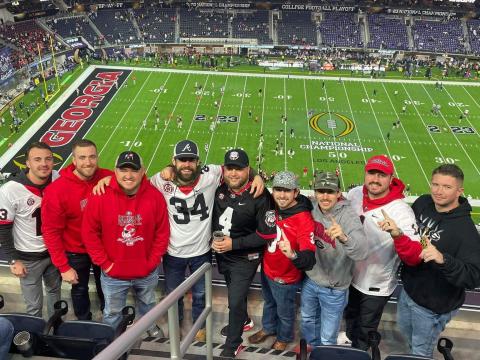 Jeremy Perry (second from left) and the crew at United Roofing enjoyed the national championship game together. Shown are (from left) Cody Mixon, Perry, Jordan Lovell, Devin Welborn, Nathan Thieme, Drey Loggins, Trent Wall, Drew Bryant and Justin Rochester. JEREMY PERRY/Submitted