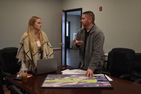 Habersham County Grant Coordinator Lauren Long discusses the future of Habersham County Airport with Airport Manager Will Regan on Thursday. EMMA MARTI/Staff 
